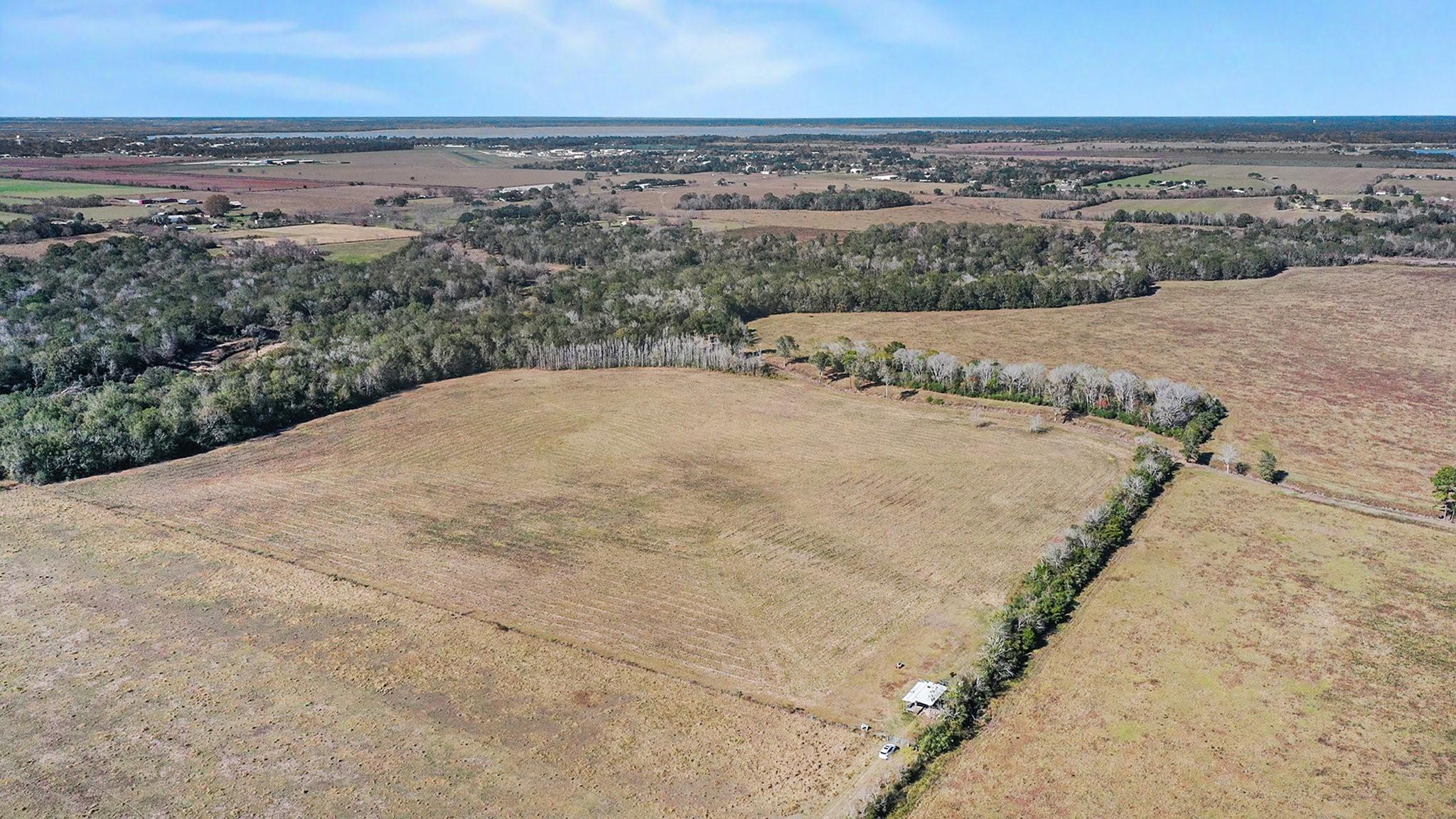 Image 3: Follow the tree line   This 12-acre track goes to