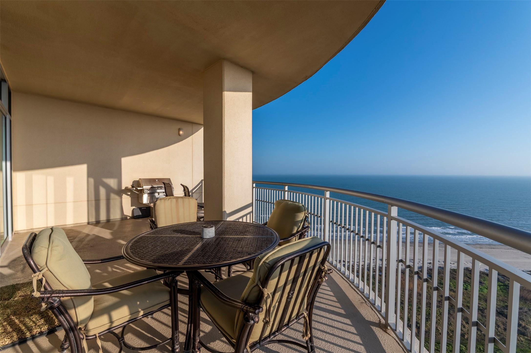 Image 2: Spacious beachfront balcony has plenty of space fo