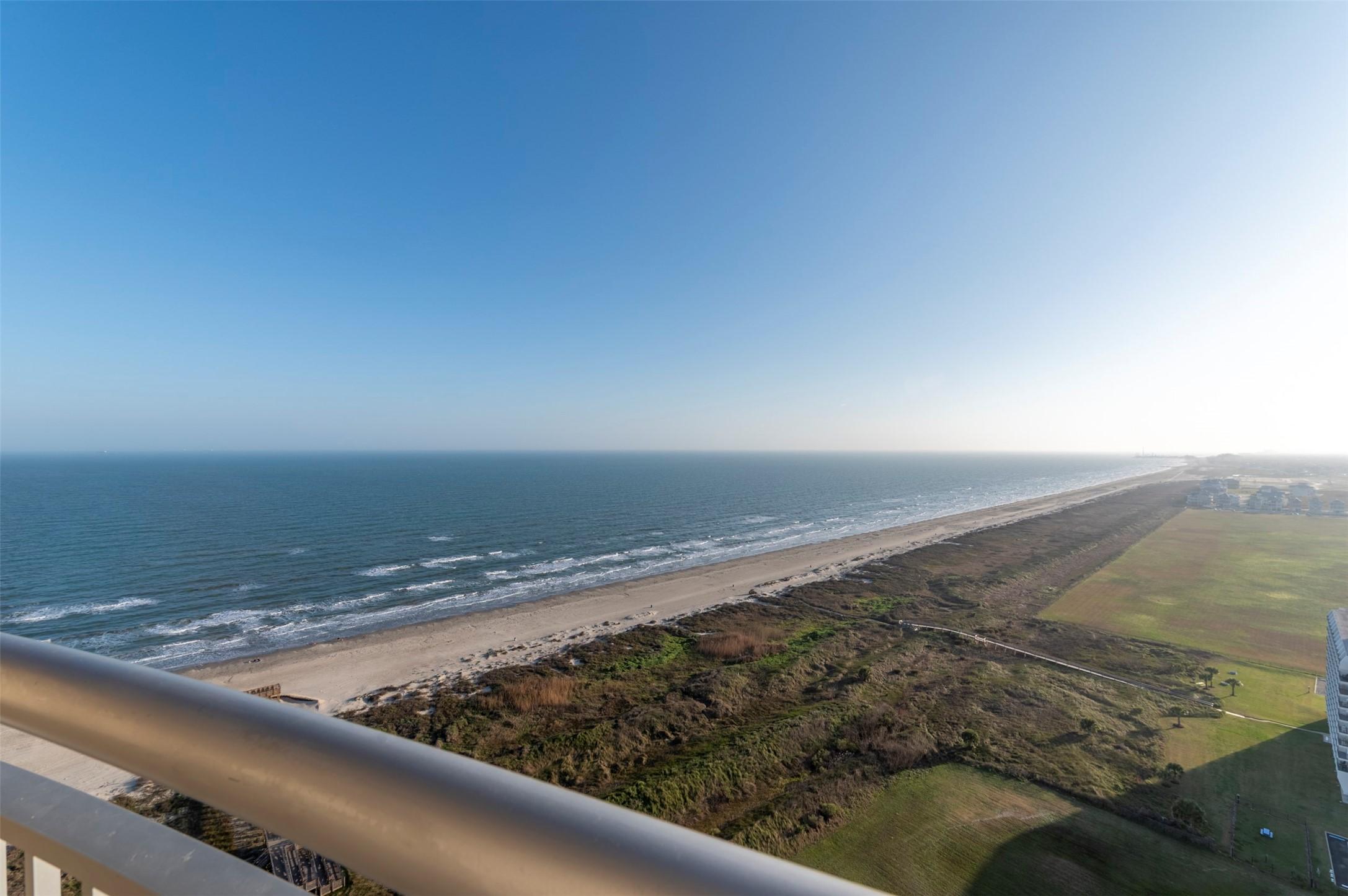 Image 3: Stunning views from the beachfront balcony to the