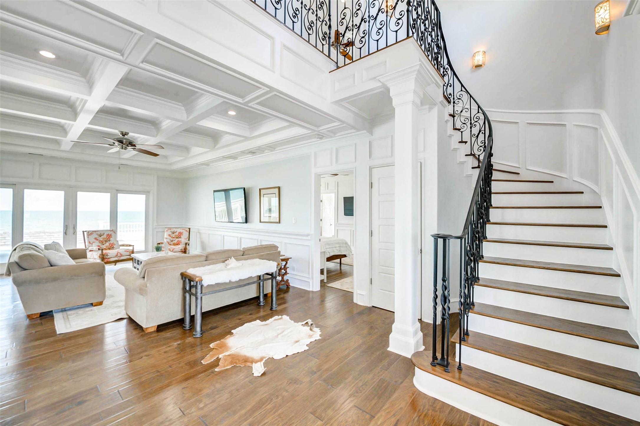 Image 3: Grand two story foyer with sweeping staircase and
