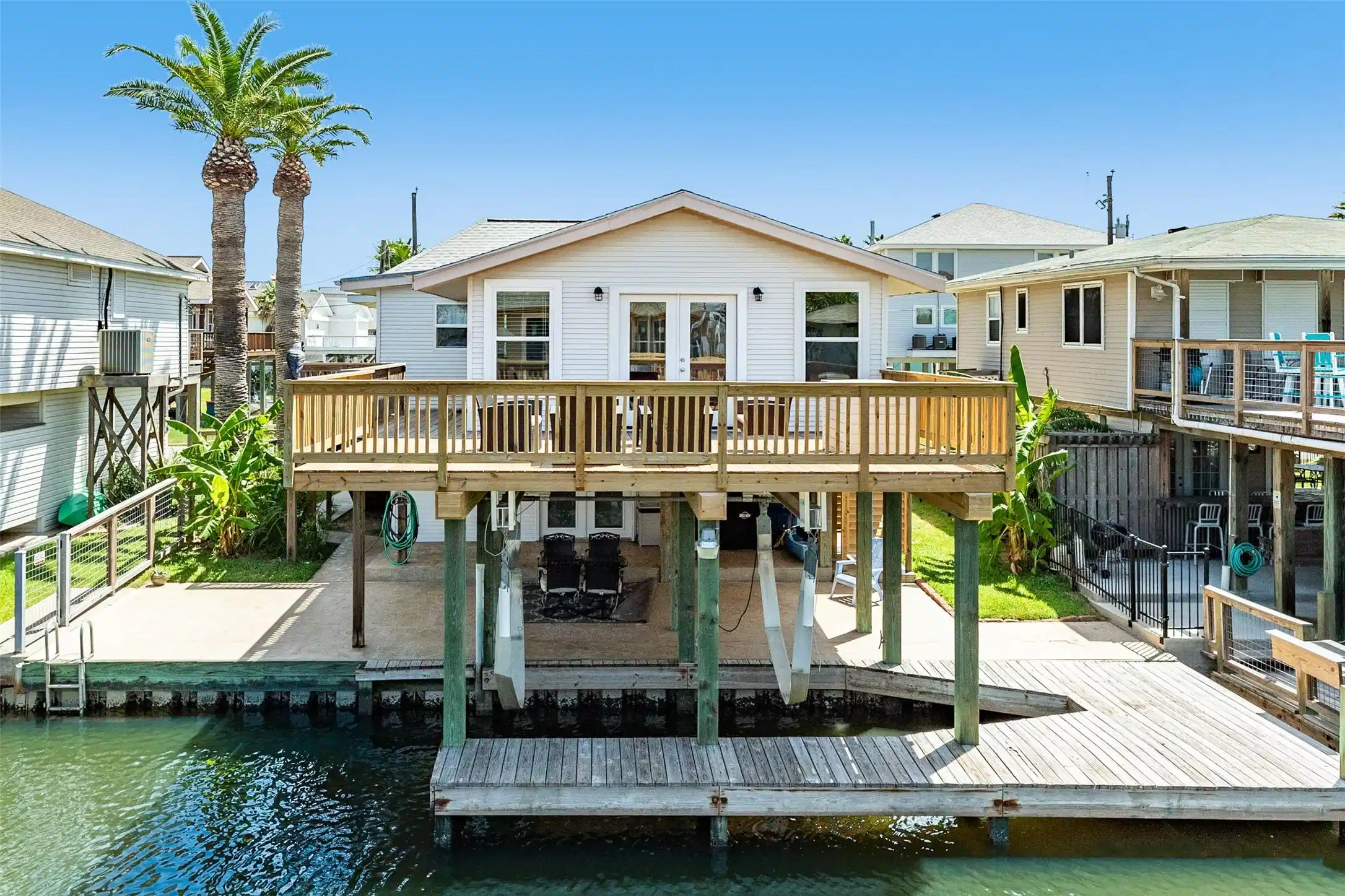 Image 1: Beautiful canal front home with large deck, covere
