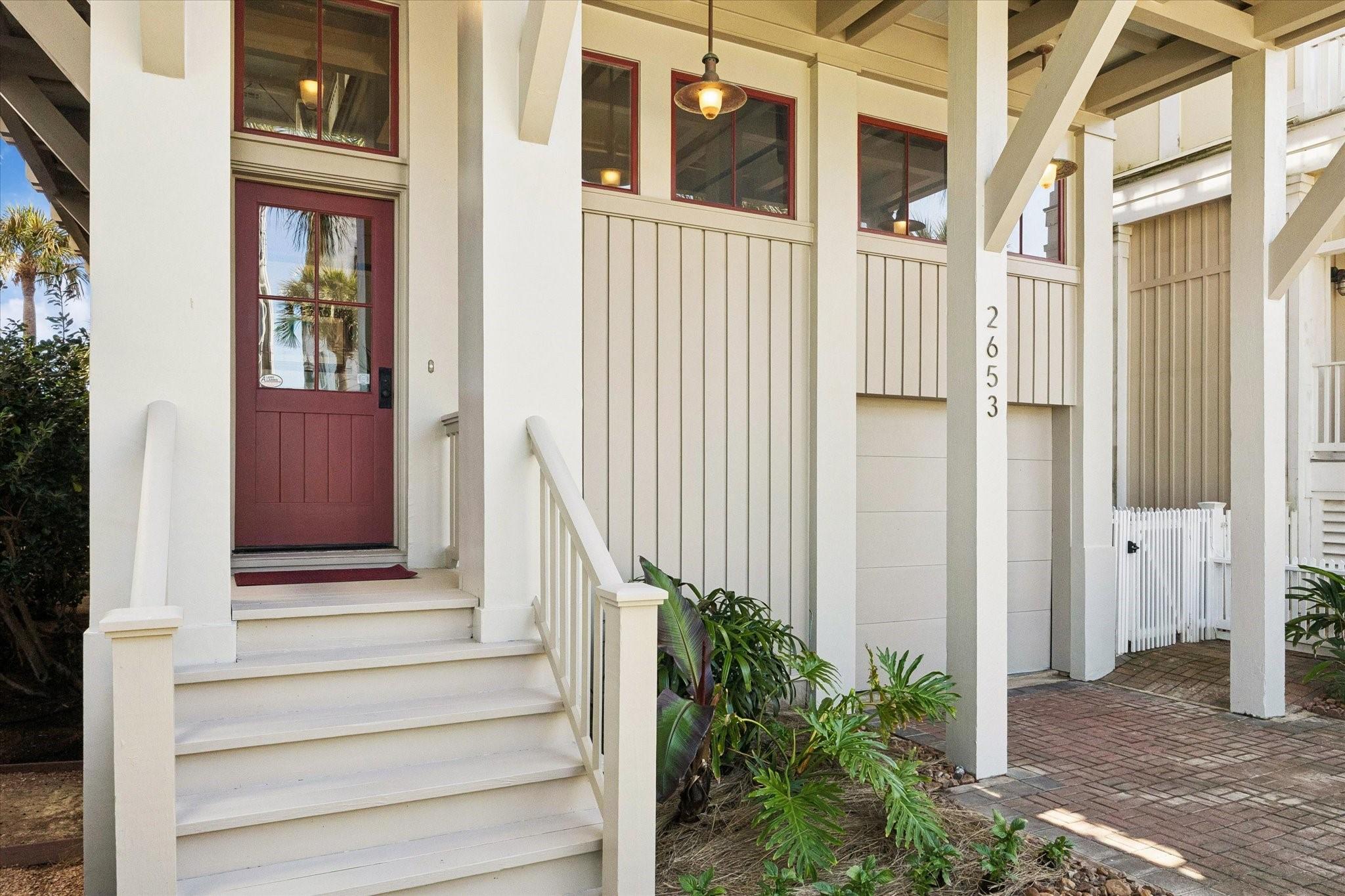 Image 2: Front entry.  Two car tandem garage on the right.