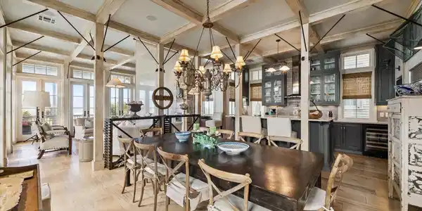 Image 4: Dining area looking towards living room and kitche