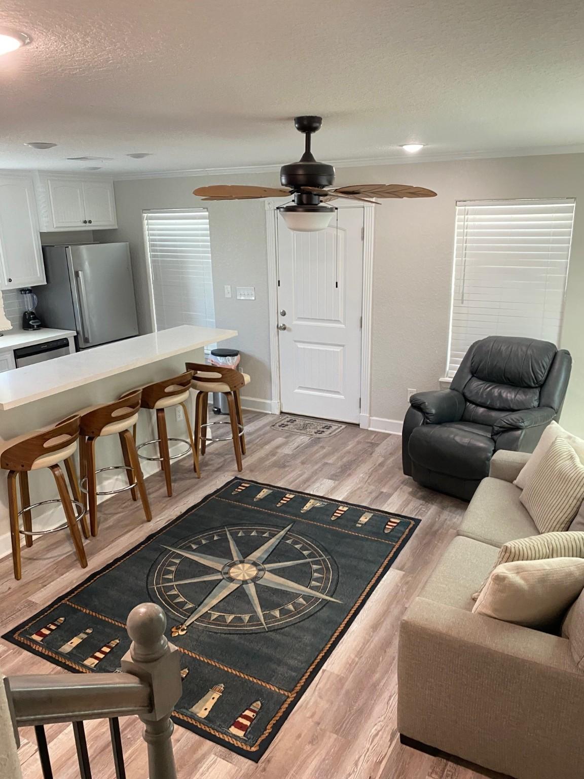 Image 2: Living Area facing Entry
