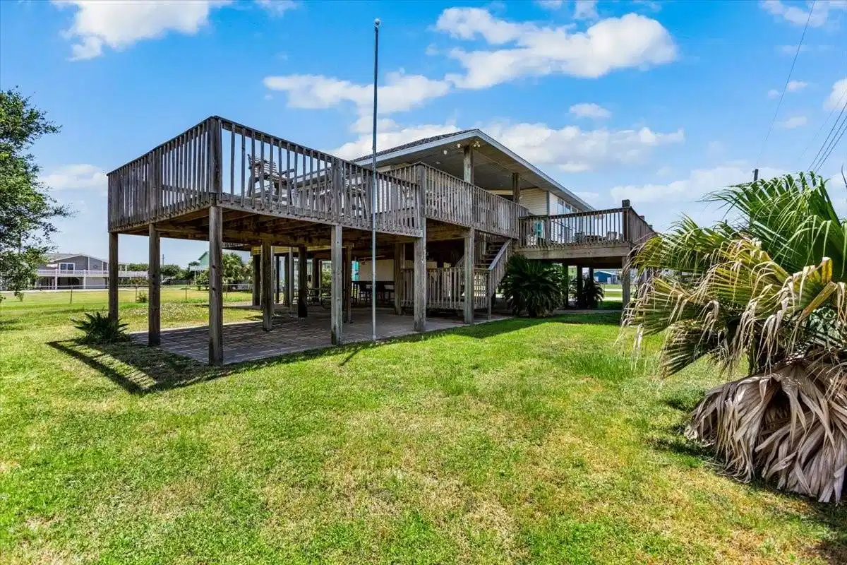 Image 1: Spacious coastal home with a large fenced yard and