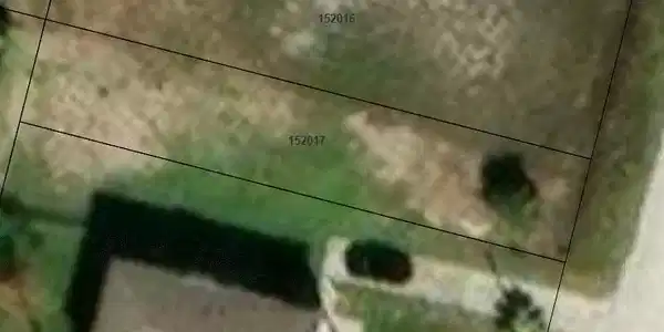 Image 2: This aerial photo shows the subject vacant lot nex