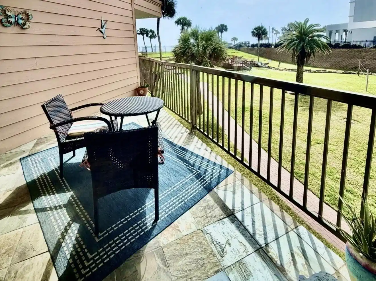 Image 1: Private balcony with views of the beach and pool a