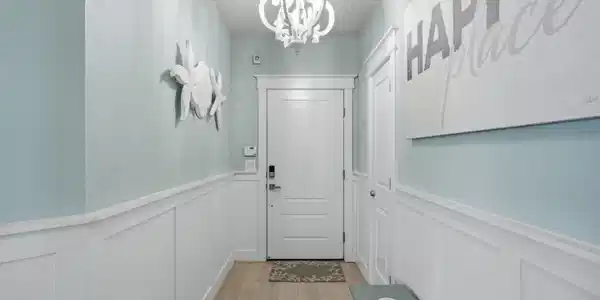 Image 4: The welcoming hallway sets the tone with bright fi
