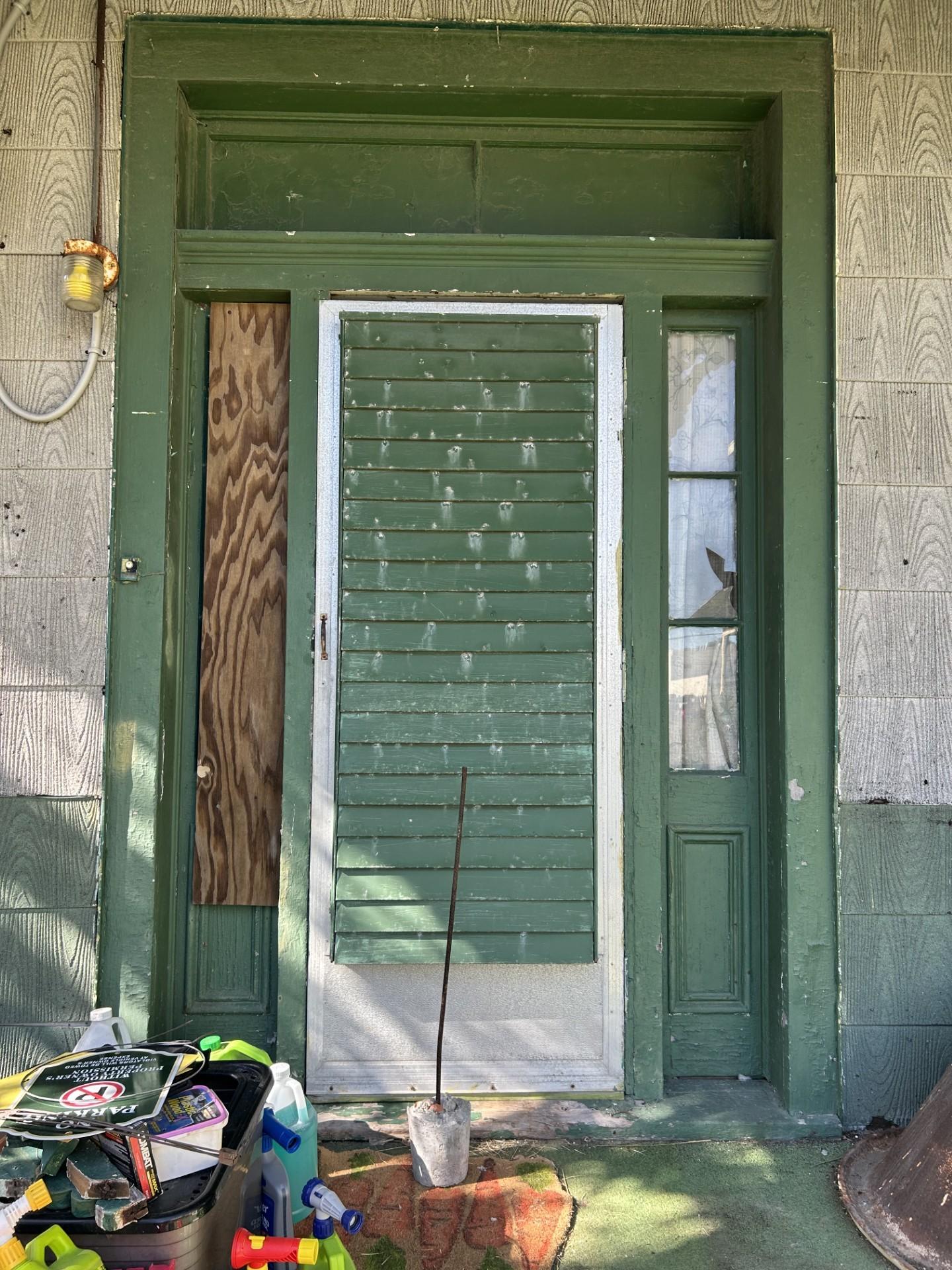 Image 4: Front door with large transom above and sidelights