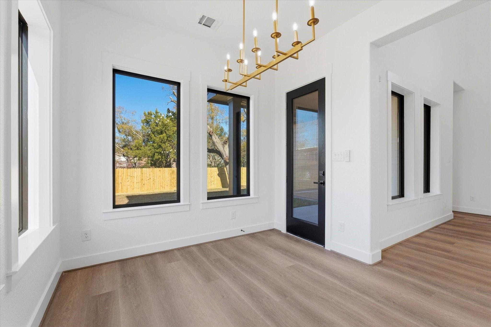 Image 3: A light-filled dining area opens directly to the c