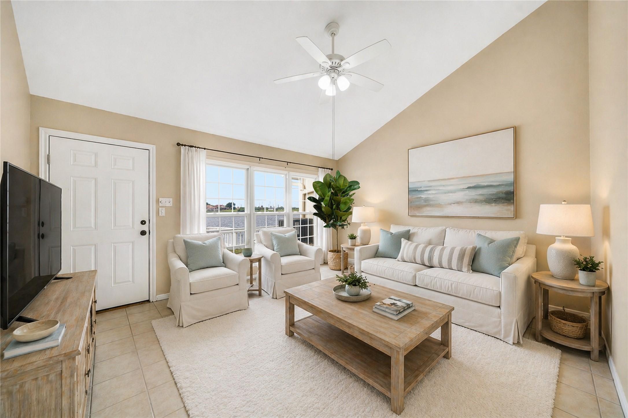 Image 2: The spacious living area enjoys a lovely view of t