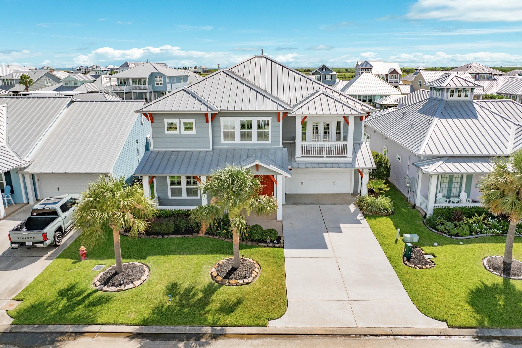 Image 2: Expansive driveway in a tranquil neighborhood, fea