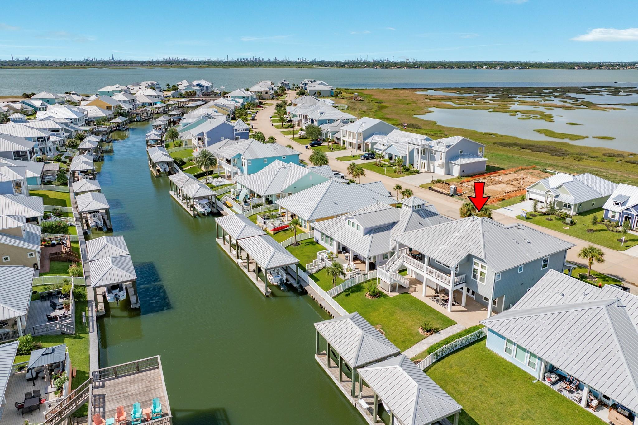 Image 4: This aerial view showcases a waterfront community