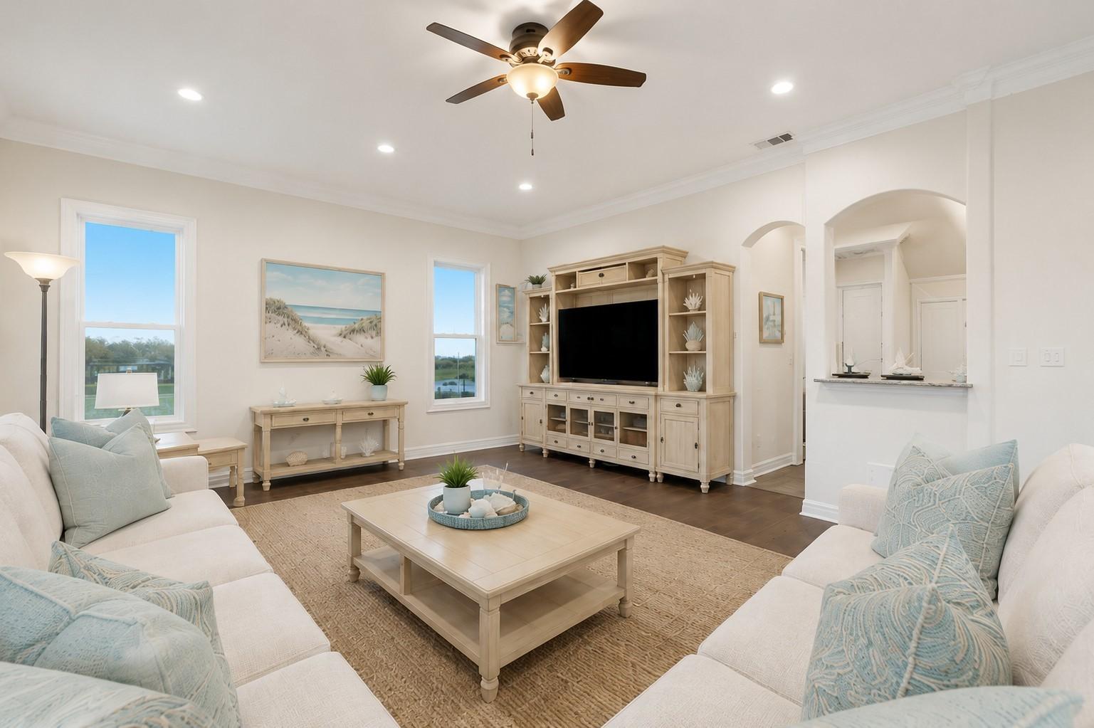 Image 4: Family room opens up to the dining area, and the b
