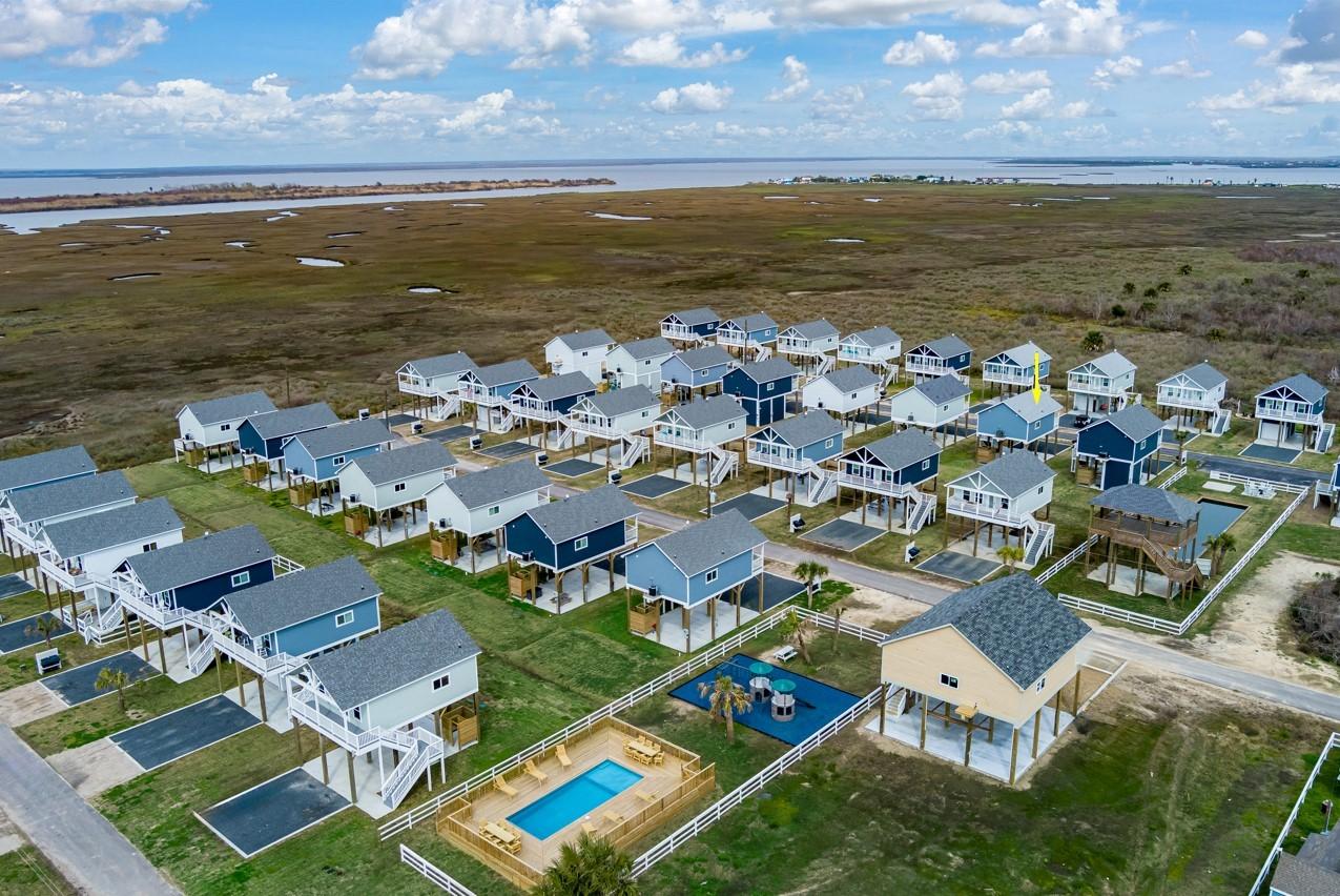 Image 3: Aerial of Villas at Rollover Bay neighborhood show