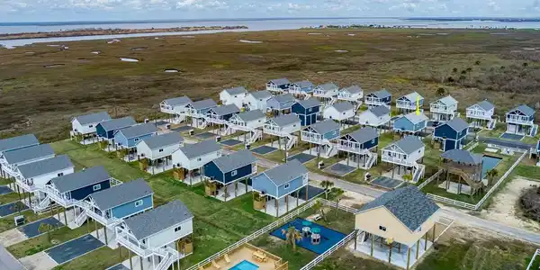 Image 3: Aerial of Villas at Rollover Bay neighborhood show