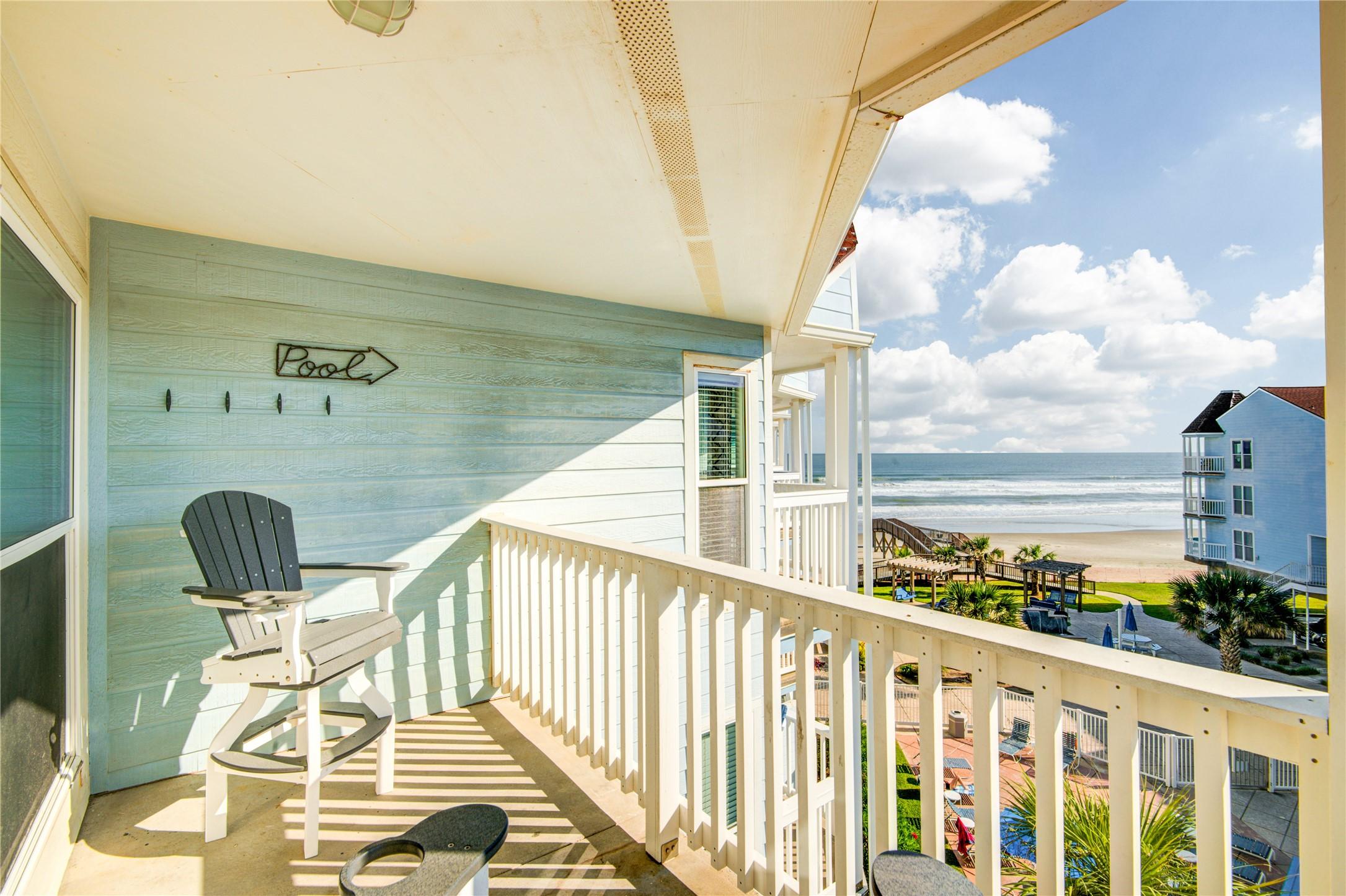 Image 1: Charming balcony with ocean views, perfect for rel