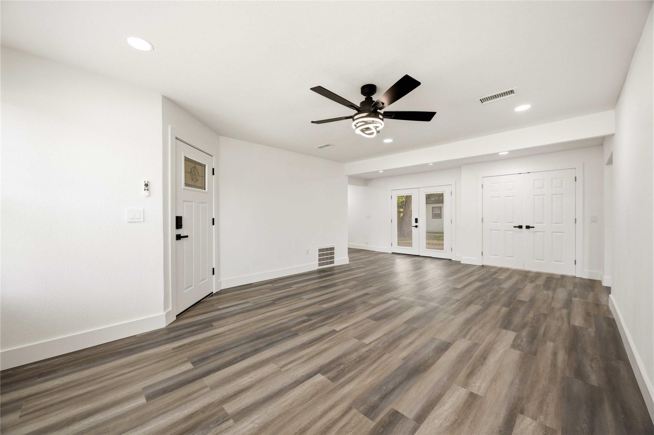 Image 2: Walk in and keep walking &mdash; living room flows strai