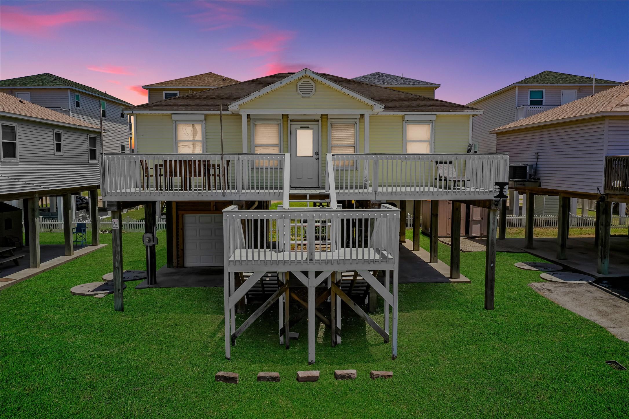 Image 1: The lawn on this image has been virtually staged.
