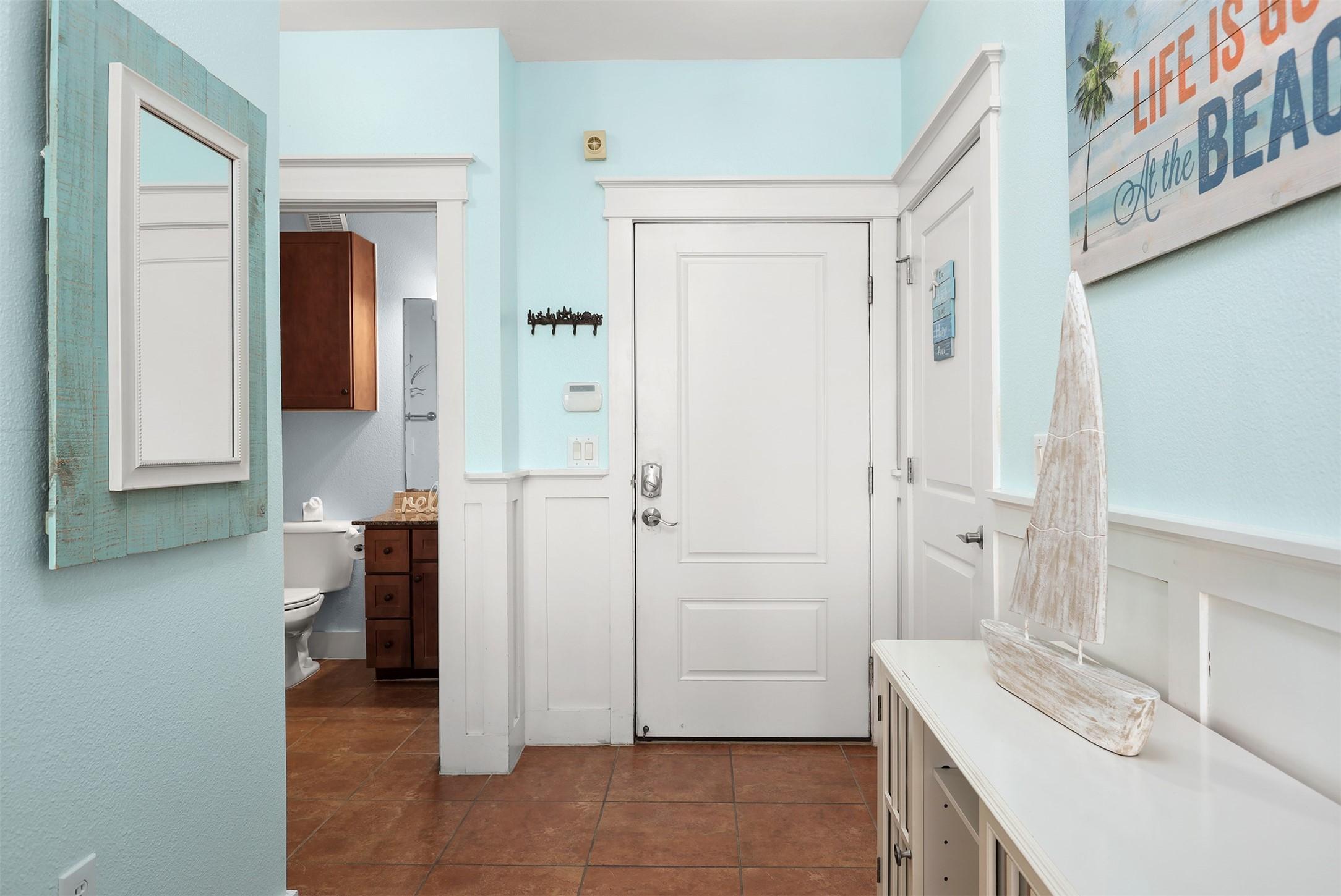 Image 4: Upon entering, you&rsquo;re greeted by a welcoming foyer