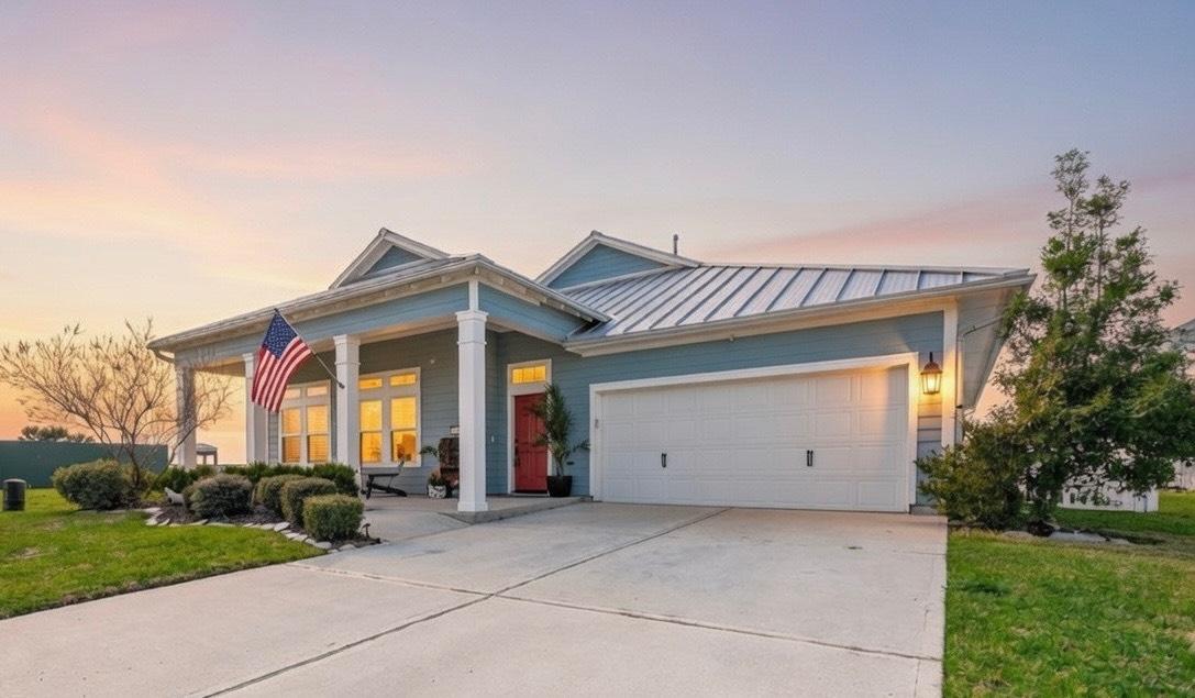 Image 2: Features an oversized driveway and spacious two-ca