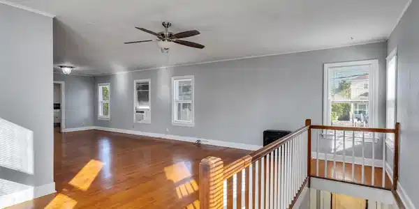 Image 4: From upstairs, soak in the open layout of the livi