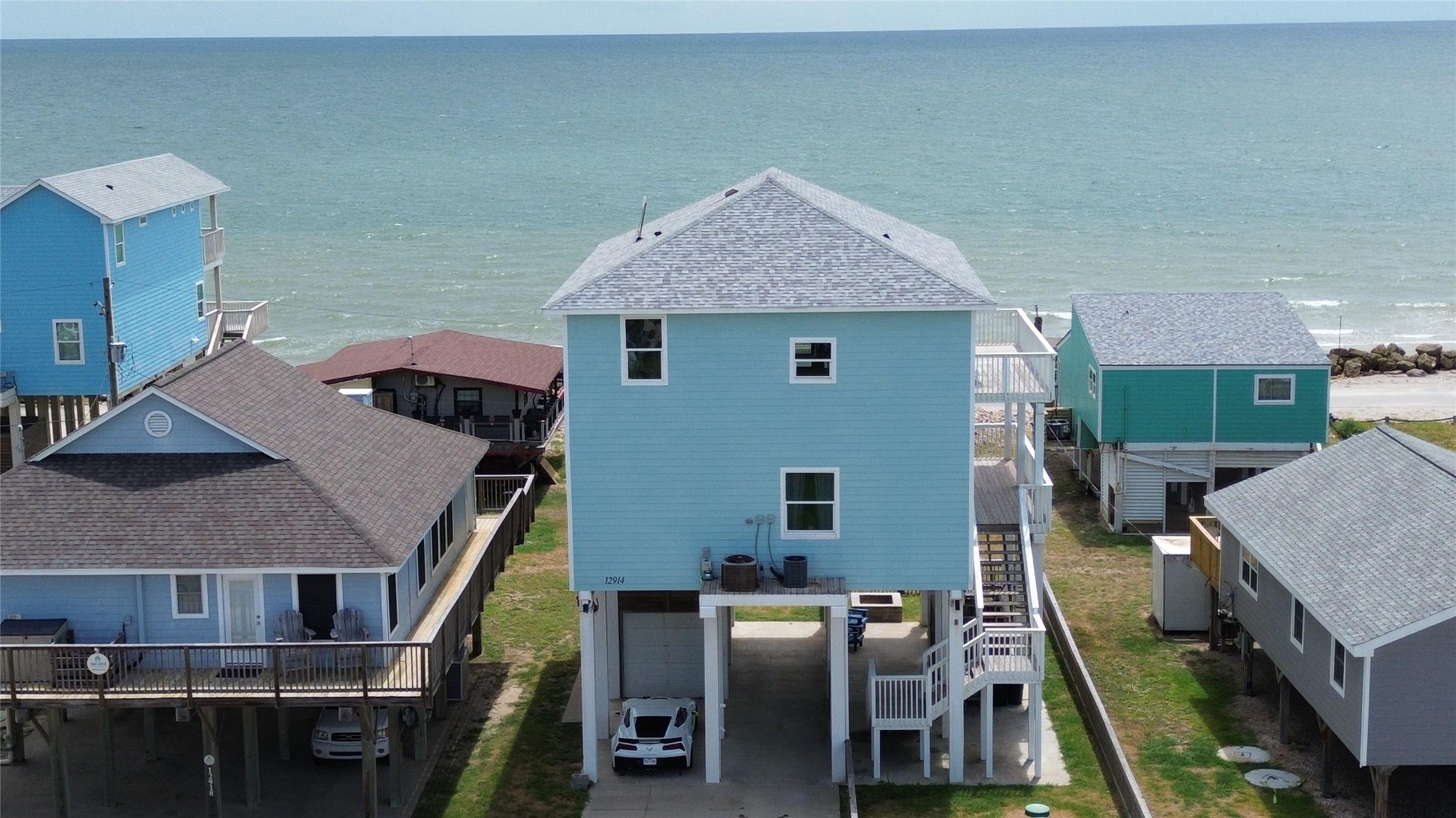 Image 2: Driveway side of house, room for 4 cars covered an
