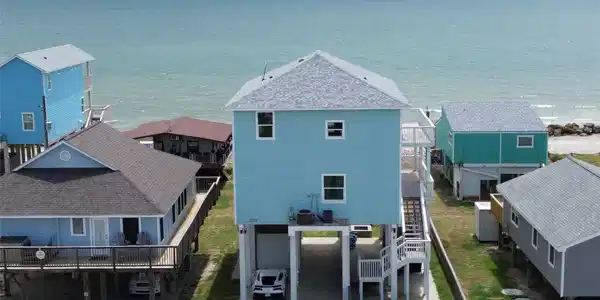 Image 2: Driveway side of house, room for 4 cars covered an