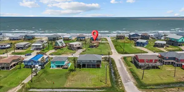 Image 4: This aerial photo showcases a charming coastal nei