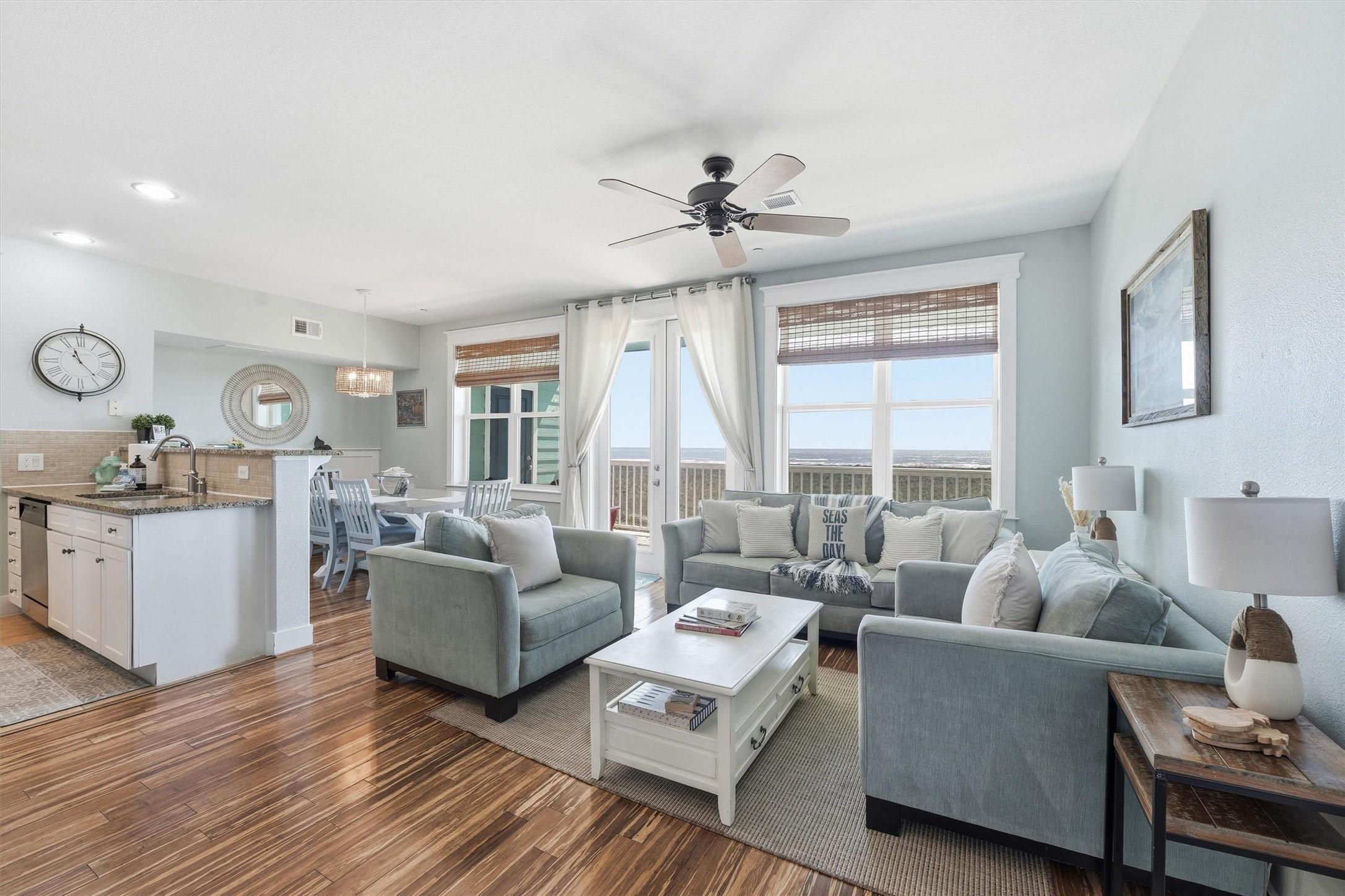 Image 3: The bright living room offers comfortable gatherin