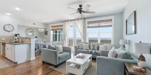 Image 3: The bright living room offers comfortable gatherin
