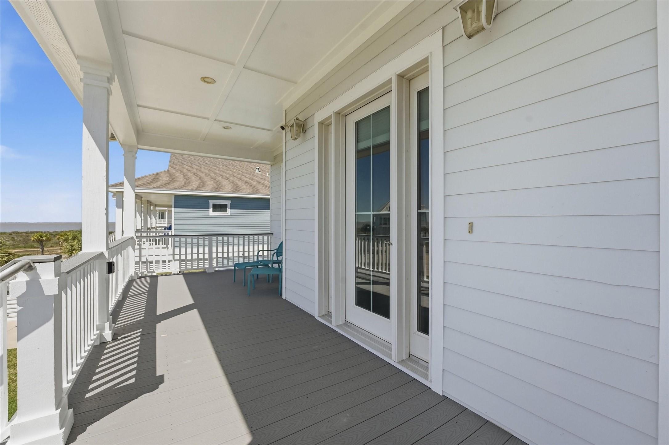 Image 4: The elevated front porch offers a welcoming outdoo