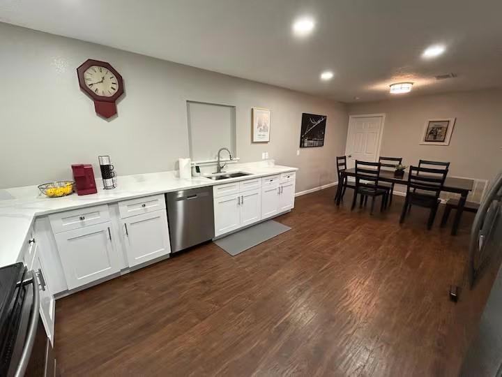 Image 2: Updated kitchen with abundant cabinetry and genero