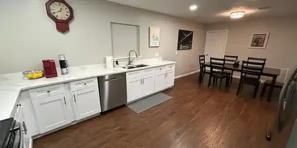 Image 2: Updated kitchen with abundant cabinetry and genero