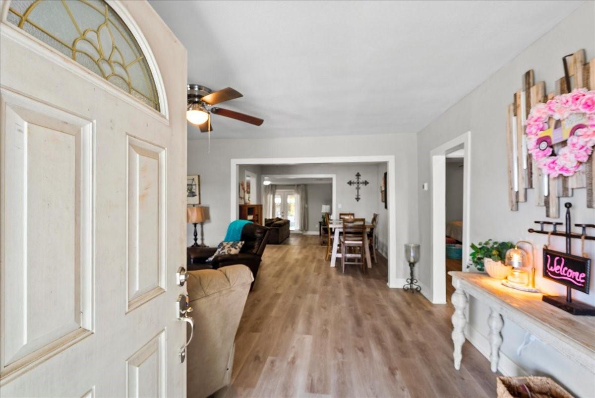 Image 4: Bright and inviting entryway that opens into a spa