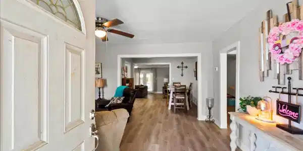 Image 4: Bright and inviting entryway that opens into a spa