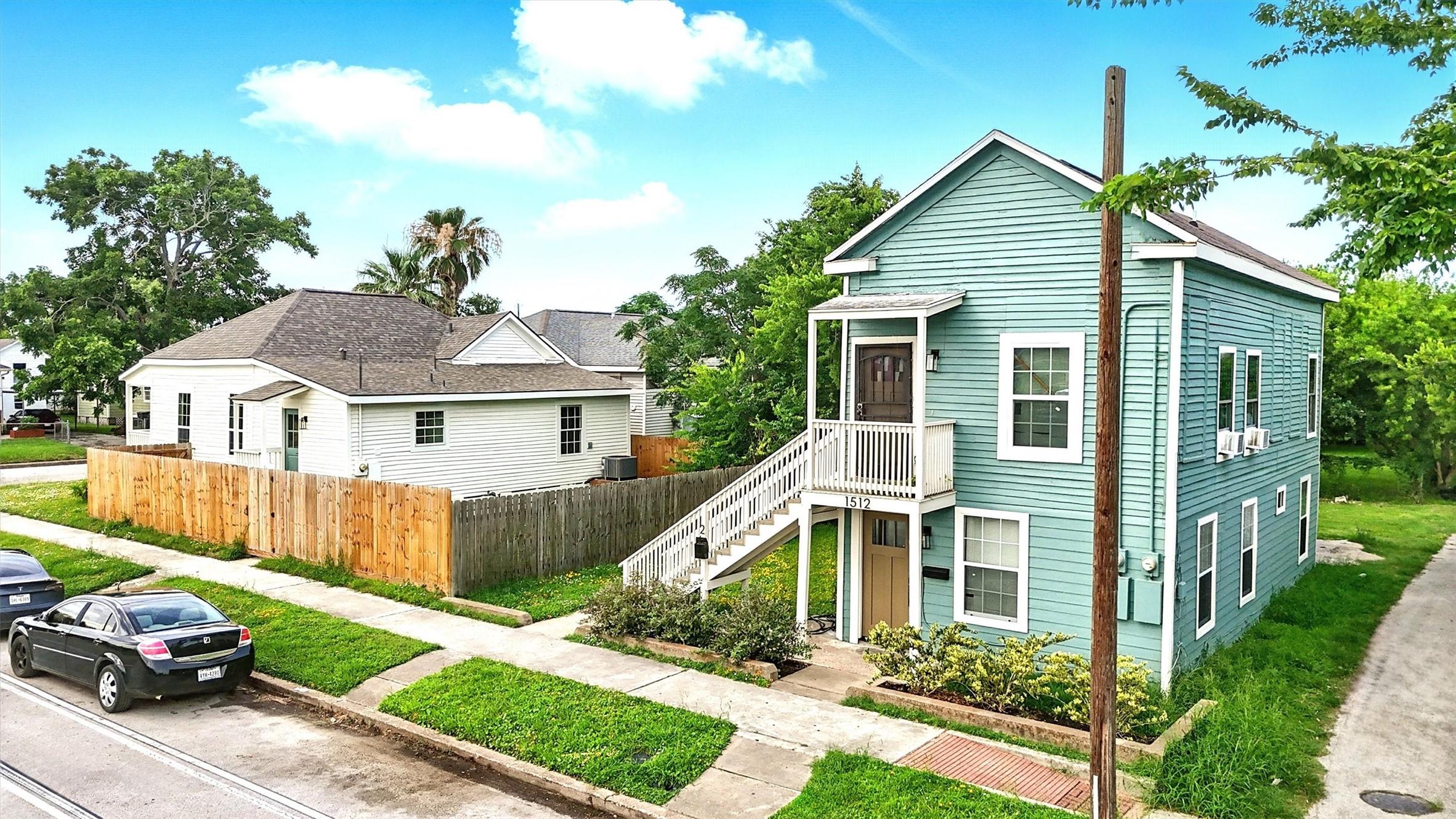 Image 2: Single Family home and duplex on the same lot but