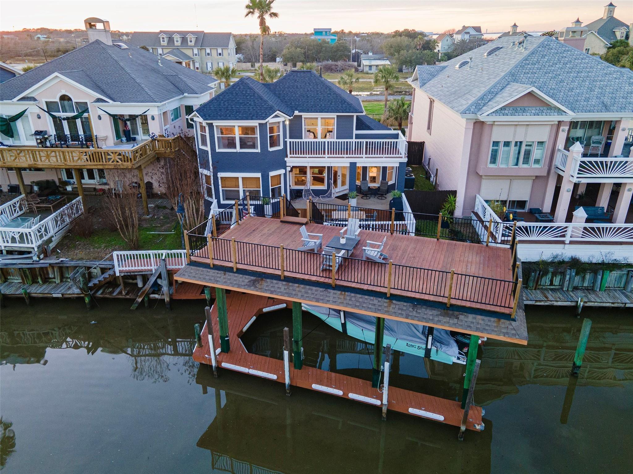 Image 1: This waterfront property is a perfect for entertai