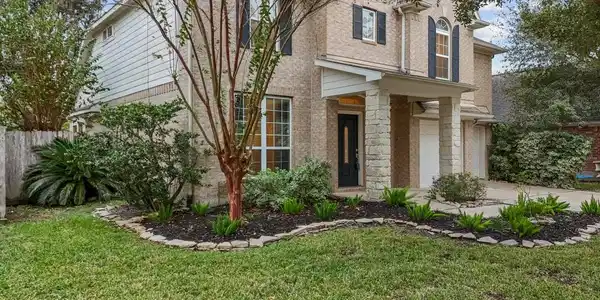 Image 2: Lush Landscaping with Sprinkler System