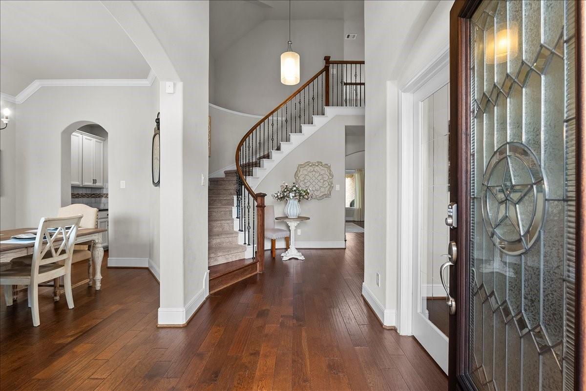 Image 4: Enter to soaring ceilings and a dramatic curved st