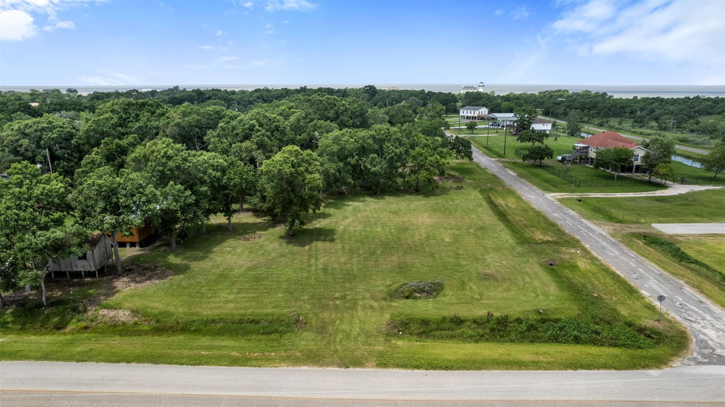Image 1: corner lot located on West Bayshore and Oak Island