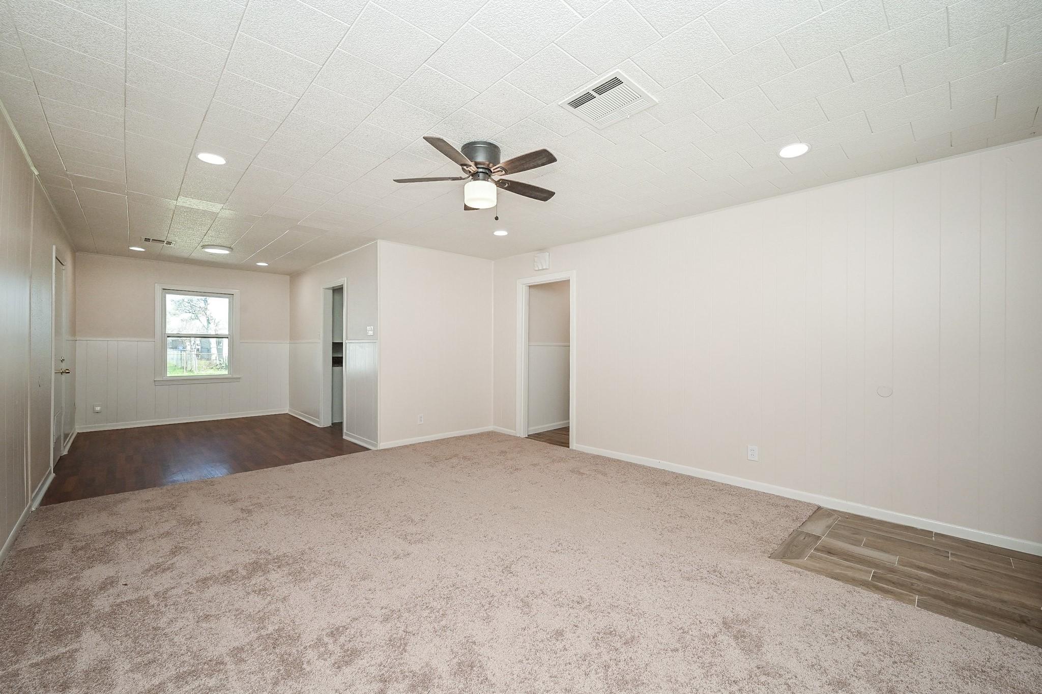 Image 4: As you enter the home you'll find this large famil