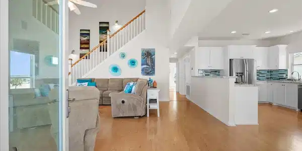 Image 2: Enter to soaring ceilings and open-concept living