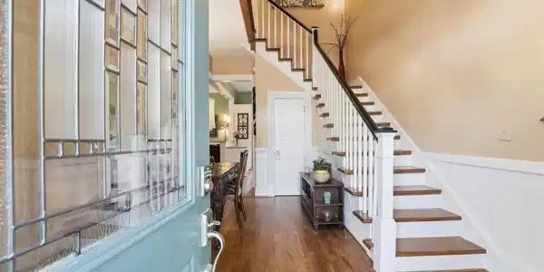 Image 3: Welcoming entry foyer featuring original wood floo