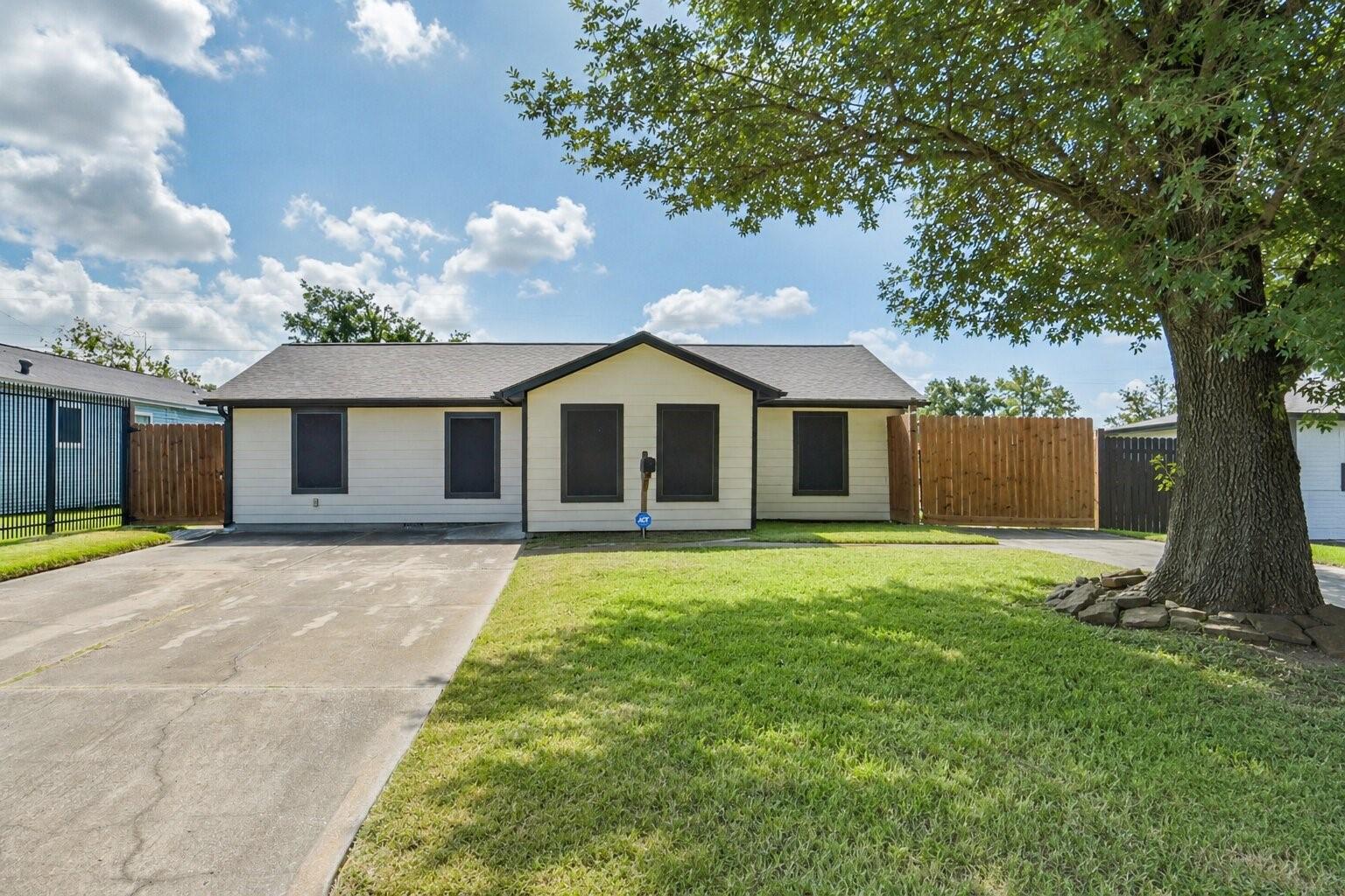 Image 1: Charming single-story home featuring a welcoming d