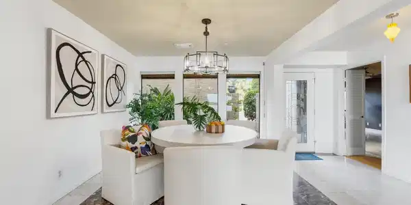 Image 4: Dining room: Open dining area flows seamlessly int