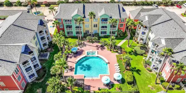 Image 3: Resort style living awaits with a beautifully land
