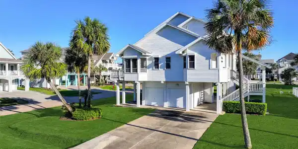 Image 2: Situated on large corner lot with plenty of parkin