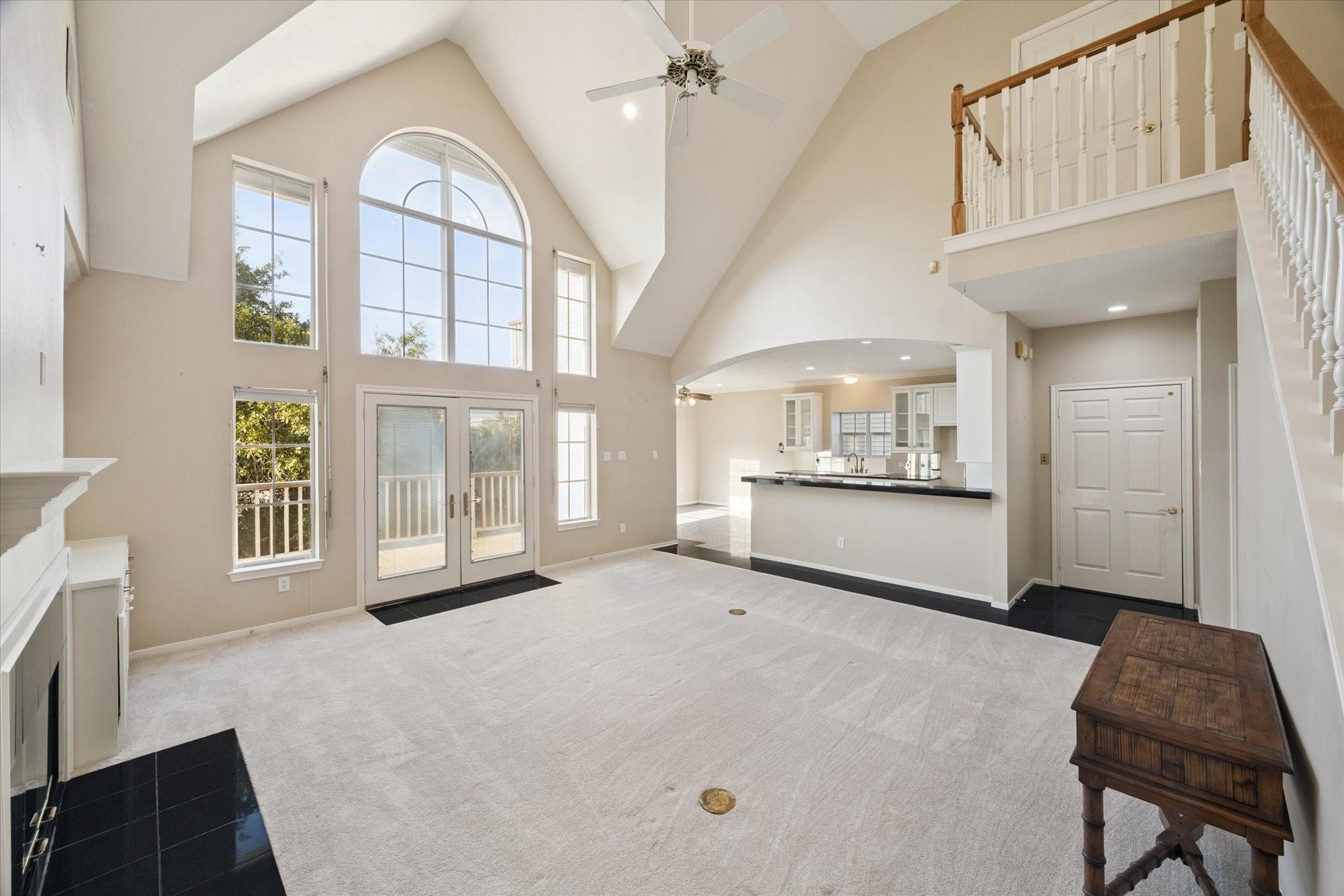 Image 1: Soaring vaulted ceilings with large arched windows
