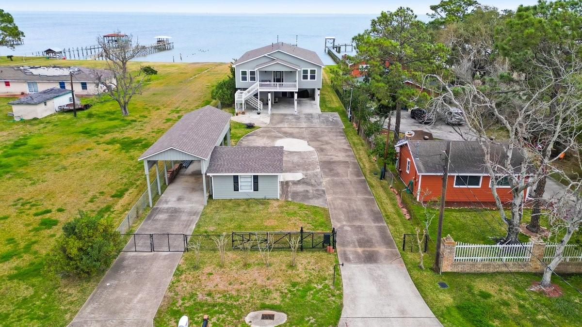 Image 2: From above, the property reveals its impressive fo